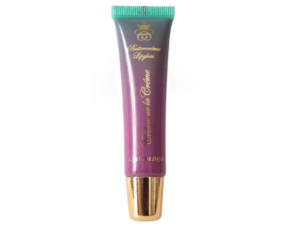 purple lip gloss in squeeze tube with gold cap on white background