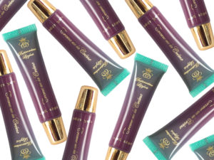 a rich mauve lip gloss in a squeeze tube with gold cap