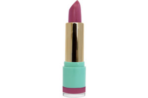 magenta lipstick with gold case in blue container on white background