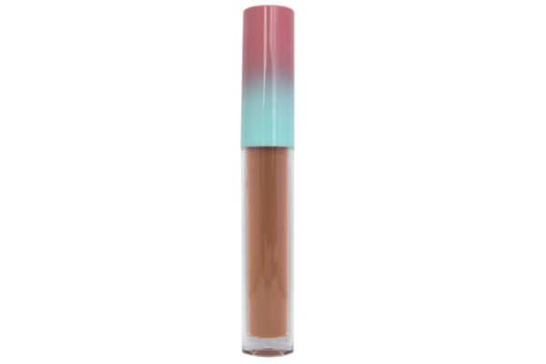 nude matte liquid lipstick in clear tube with pink and blue cap on white background