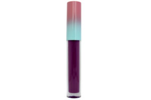 mauve matte liquid lipstick in clear tube with pink and blue cap on white background