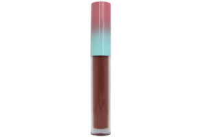 brown red matte liquid lipstick in clear tube with pink and blue cap on white background