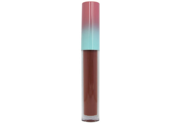 brown red matte liquid lipstick in clear tube with pink and blue cap on white background