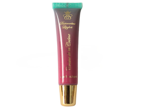 brown lip gloss in squeeze tube with gold cap on white background