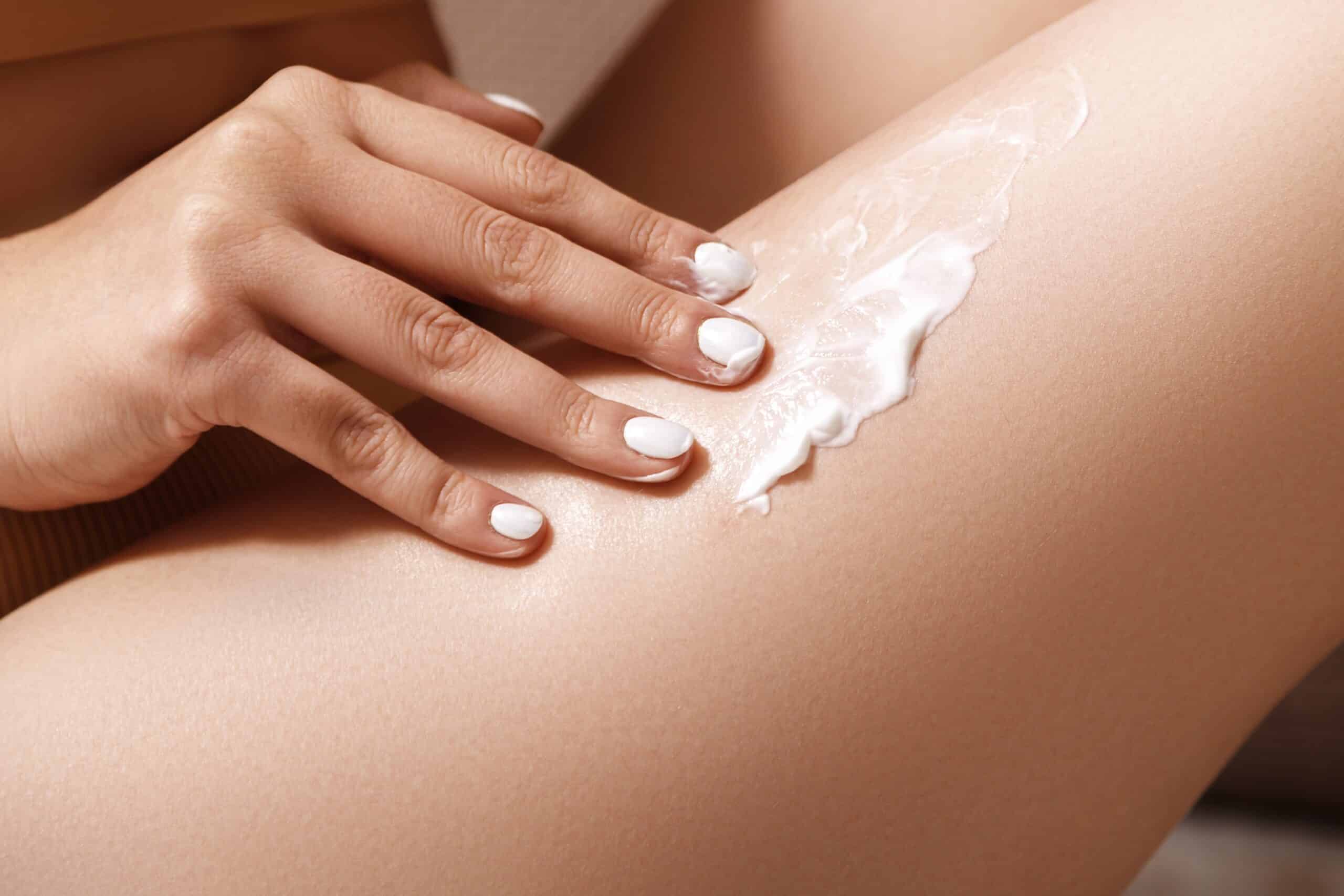 Skin Care, a woman applying Crème Fraîche on her legs