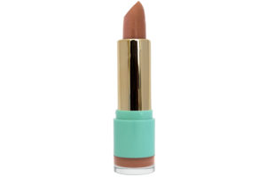 brown-nude lipstick with gold case in blue container on white background