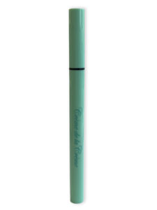 liquid eyeliner eyelash adhesive in green pen tube on white background