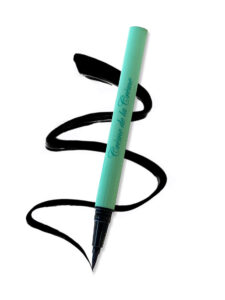 liquid eyeliner eyelash adhesive in green pen tube with liquid eyeliner squiggle on white background