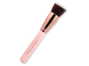 Flat top brush with pink handle and rose gold ferrule.
