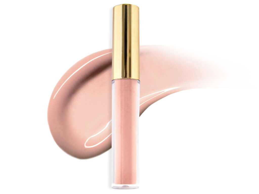 lip gloss tube gold cap sheer nude pink lip gloss smeared behind lip gloss packaging on isolated white background crème de la crème beauty