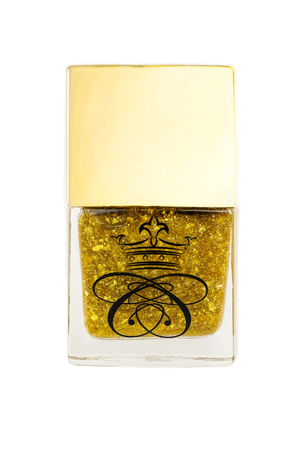 Black Label Nail Gloss Expensive, glass bottle with gold cap filled with 24K gold nail polish with 24K gold leaf crumpled in background