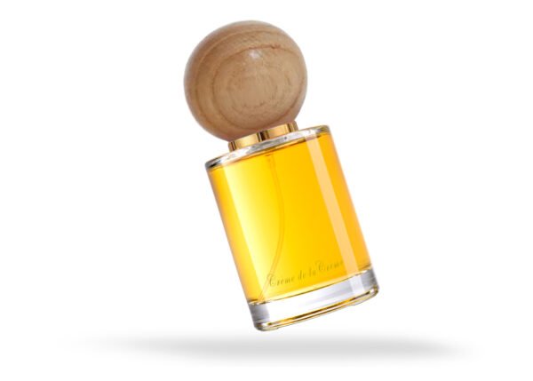 Love Potion Eau de Parfum in 50ml glass bottle round wood ball cap closure on isolated white background