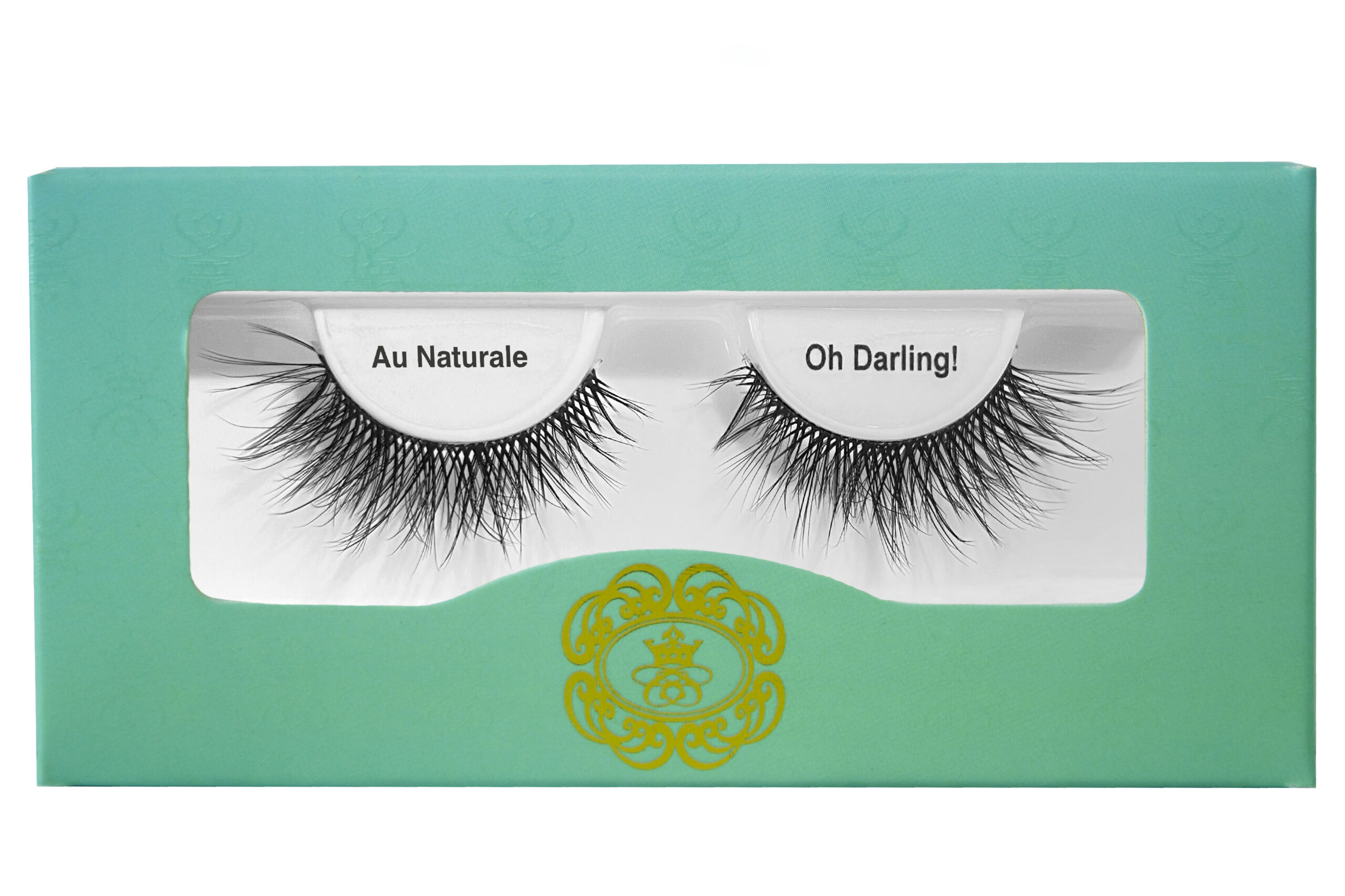 Biodegradable Eyelash Collection black strip eyelashes in gradient blue-green eyelash box on white isolated background.