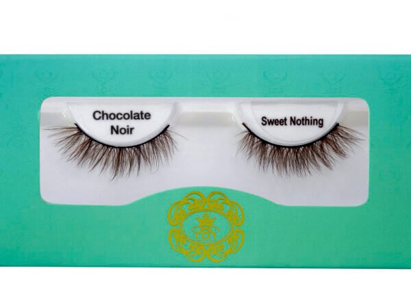 Brown coloured false eyelashes, brown eyelashes in white lash tray inside teal box on white background