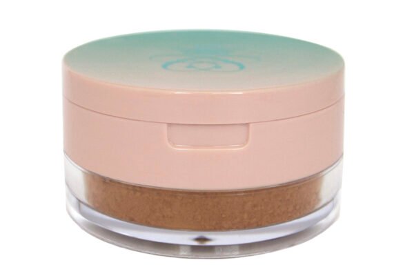 Turbinado Sugar Baking & Setting Poudre loose makeup powder in translucent plastic jar with pink flap cap lid.