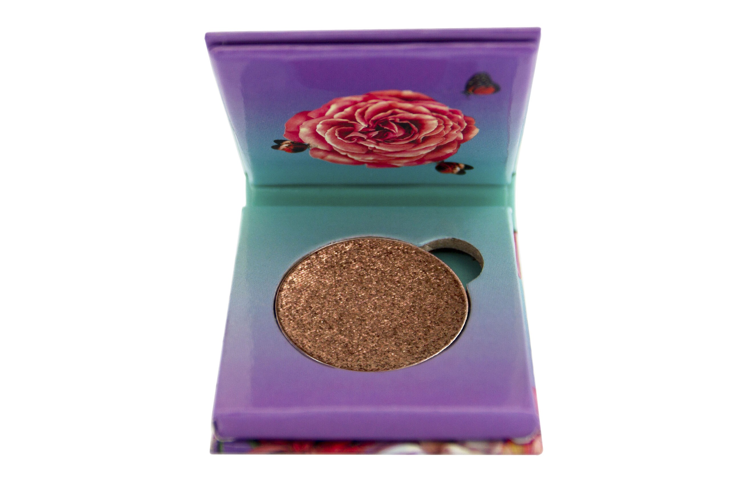 Flamingo Paradise Immortal Foiled Eyeshadow sitting inside purple and blue 1 pan paper package