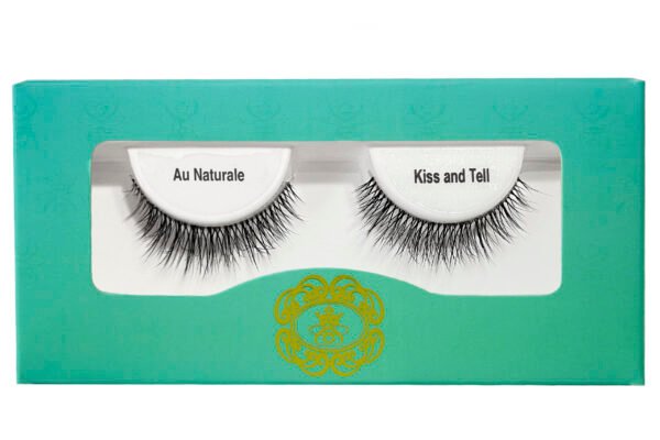 black strip eyelashes in gradient blue-green eyelash box on white isolated background.