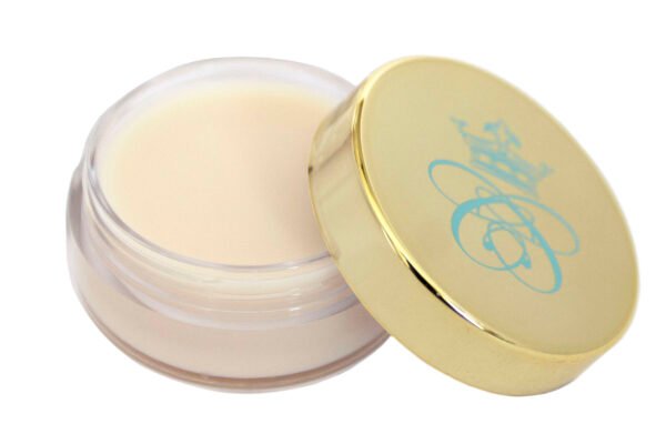 translucent, off-white lip balm in transparent plastic jar with shiny gold lid