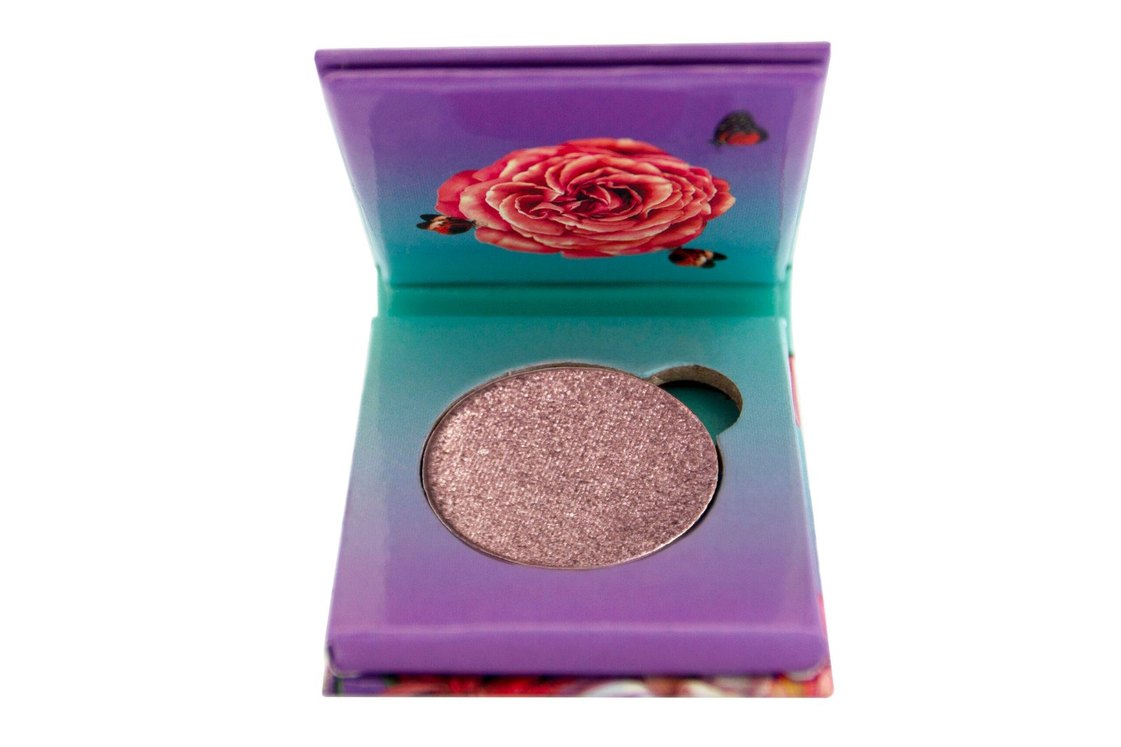 Flamingo Paradise Pink Bubbly Foiled Eyeshadow sitting inside purple and blue 1 pan paper package