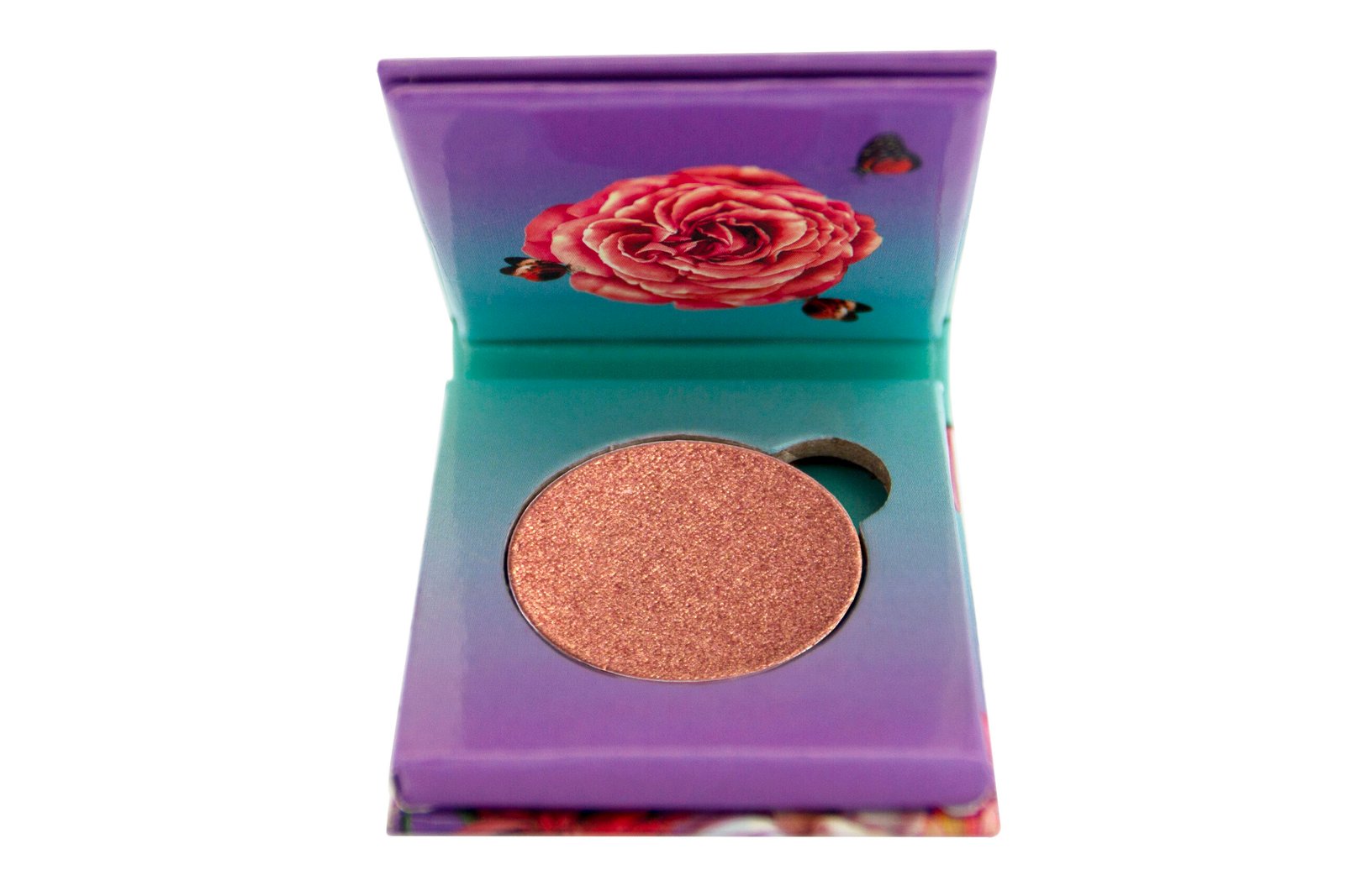 Flamingo Paradise Razzle Dazzle Foiled Eyeshadow sitting inside purple and blue 1 pan paper package