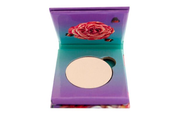 Flamingo Paradise Matte Eyeshadow sitting inside purple and blue 1 pan paper package