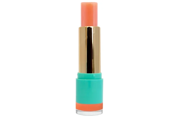 Water Balm Lip Serum translucent peach tinted lip balm treatment in gold and blue lipstick vase on white isolated background