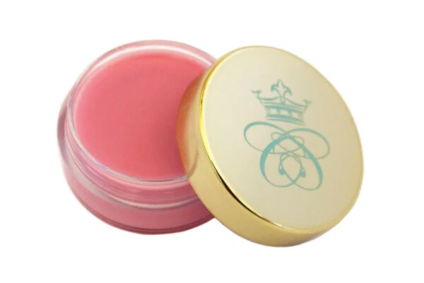 strawberry flavoured lip balm in transparent plastic jar with shiny gold lid