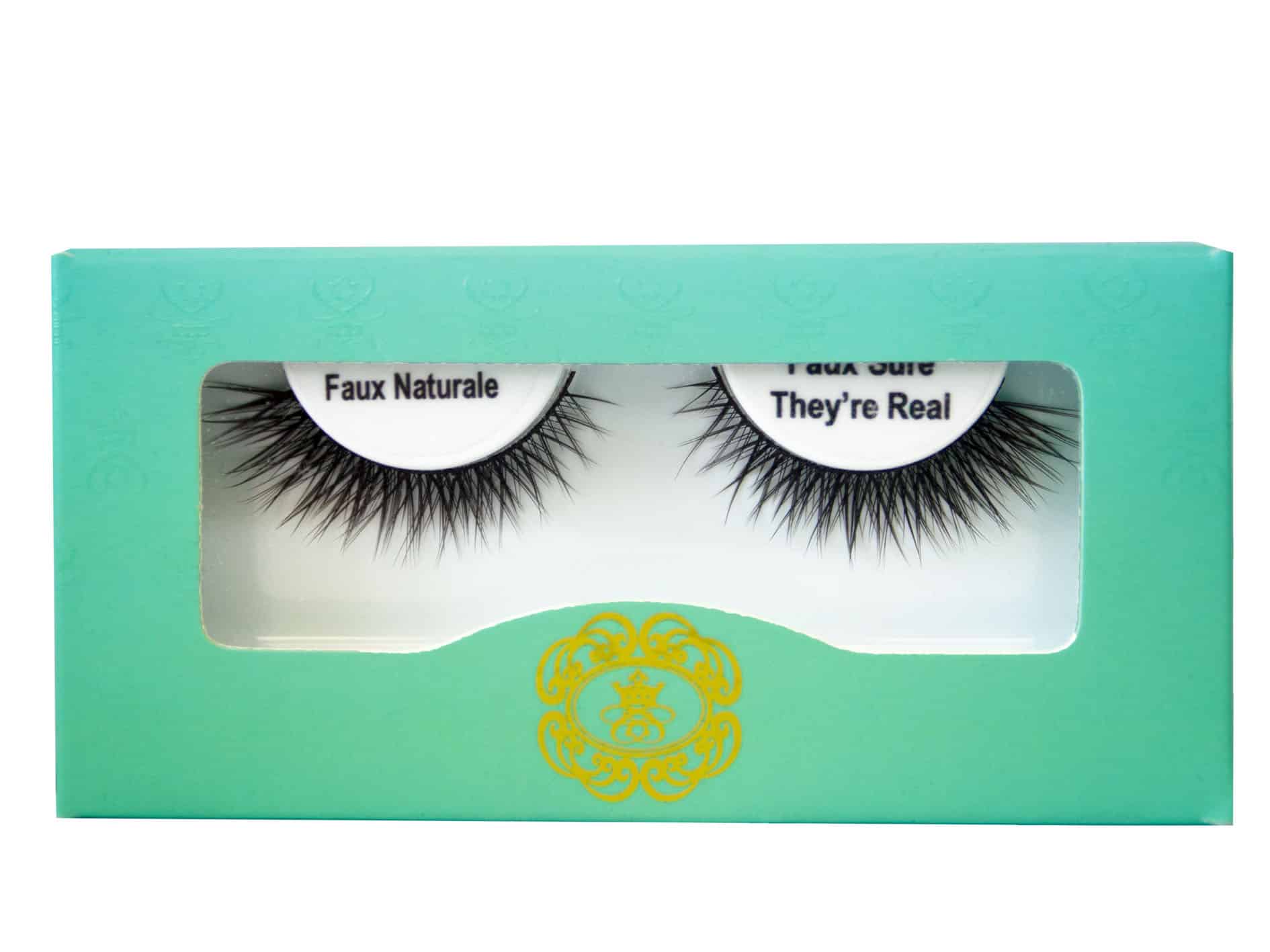 Faux Sure They're Real Eyelash on white eyelash tray inside blue-green box packaging